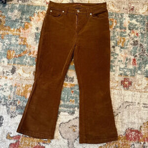 Brown corduroy flare leg pants. 7 For All Mankind.